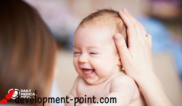 When does a newborn baby laugh?