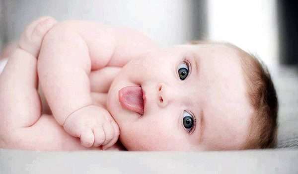 Why does a baby stick out its tongue?